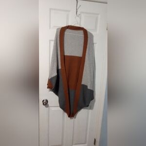 Brown and Gray shrug, unknown source.